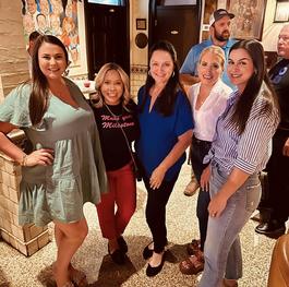Group photo at an Acadiana community event